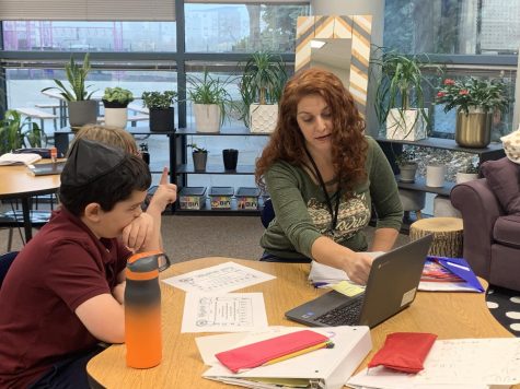 Keshet teaches two fifth graders Hebrew. Image by Avital Mullokandova