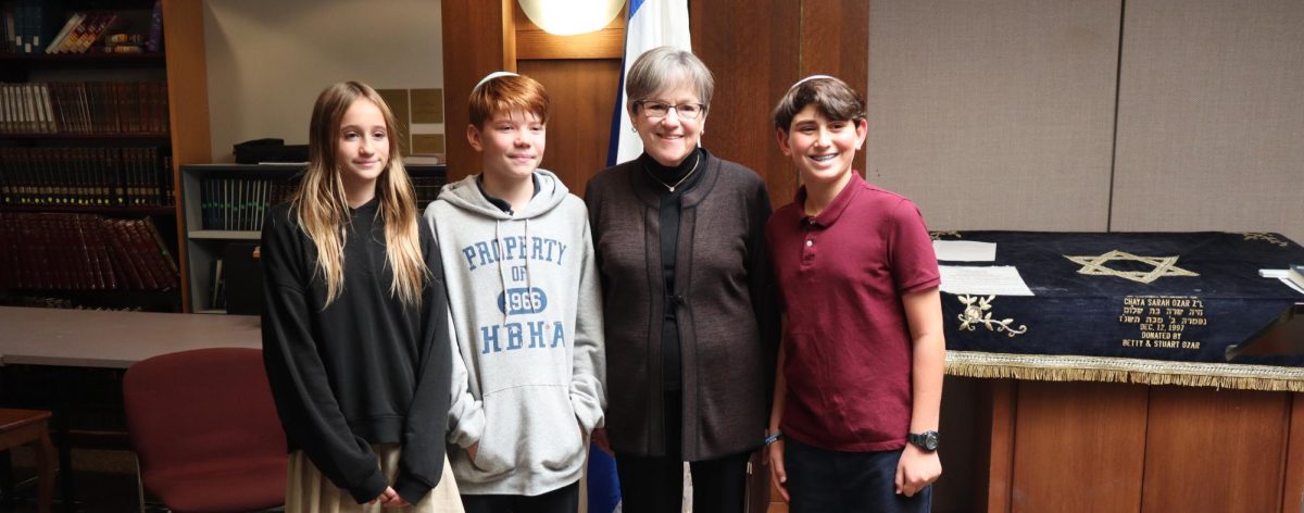 Middle school students welcome Kansas Governor Laura Kelly to HBHA. 
