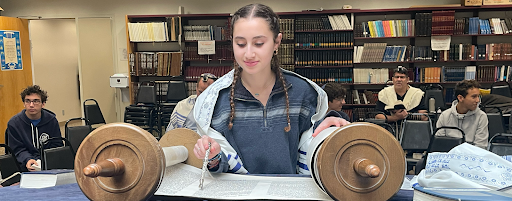 Gabrielle Sosland reading Torah during Thursday morning services.  