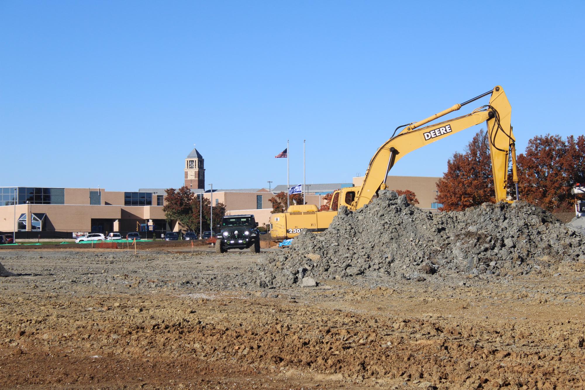 Excavator with HBHA in the back. Image by Skyler Penner 
