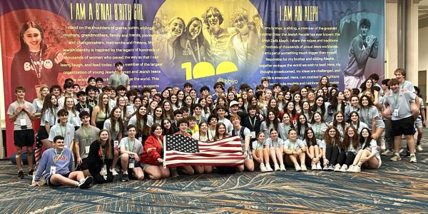 Attendees of IC from the Mid-America region (Kansas City, Minnesota, St. Louis, and Omaha) get together to take a picture showing their love for BBYO.