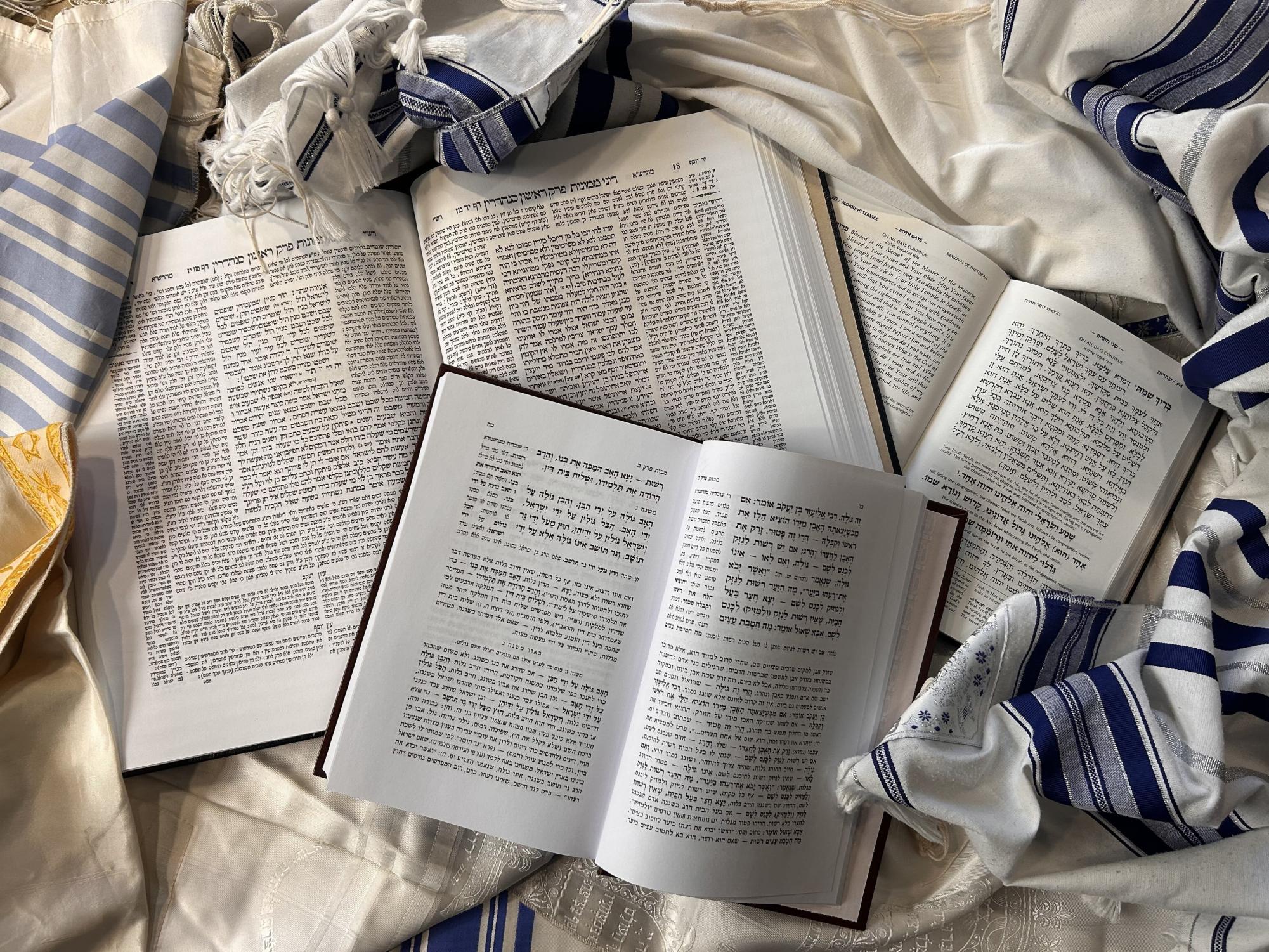 Jewish texts can be interpreted with hidden Kabbalistic meanings to enhance any Jewish experience. Applying this thought to prayer can spiritually connect us and G-d on a more intricate level. Photo by Avital Mullokandova