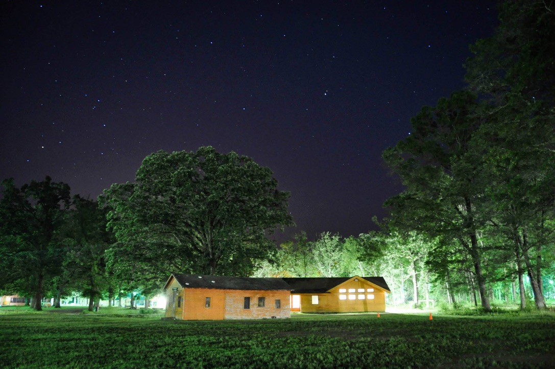 Pictured is Herzl Cabins under the starry sky. Edelman returned to camp this summer with his friends to celebrate a wedding. While there, he reflected on the beauty of the space and said, “Camp made living Jewishly fun…When I moved to DC and became an adult…I sought out the ones (synagogues/Jewish experiences) that felt most like camp.” Photo provided by Jonathan Edelman
